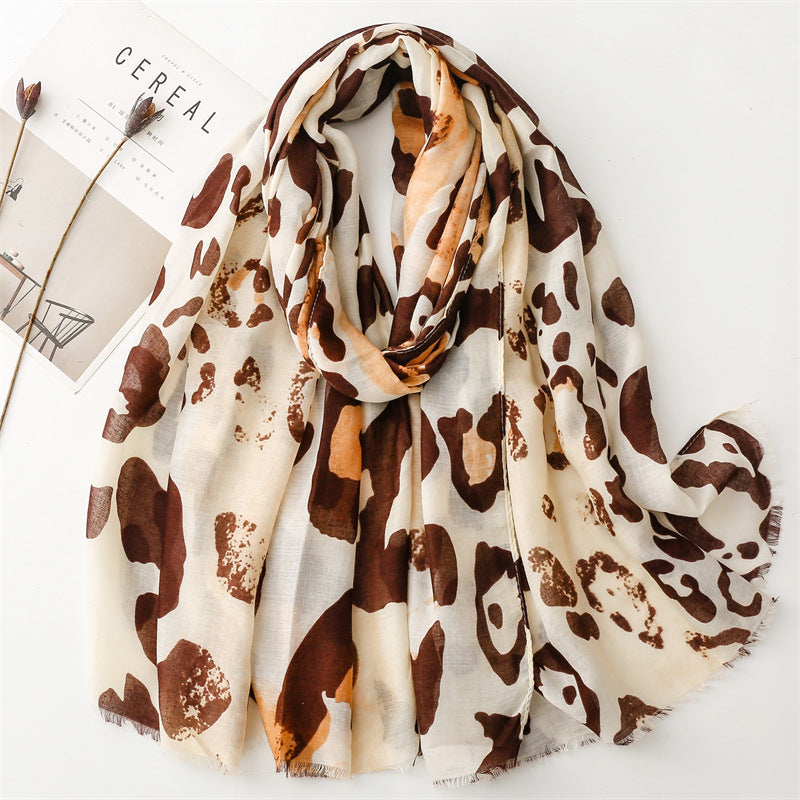 Spring and summer four seasons thin cotton and linen feel scarf European and American cloud leopard print rough edge  scarf warm shawl women